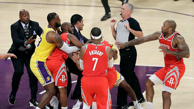 rockets_lakers_brawl_rondo_paul.jpg